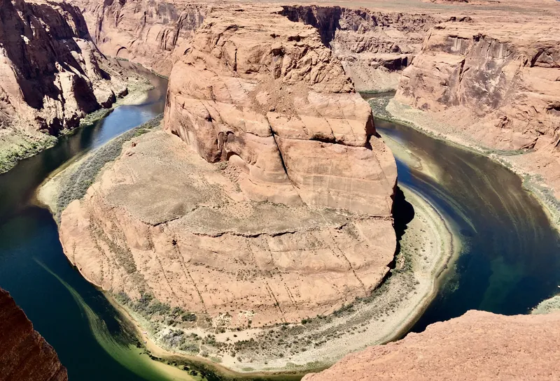 Horseshoe Bend, a tight loop of the Colorado River below sandstone cliffs