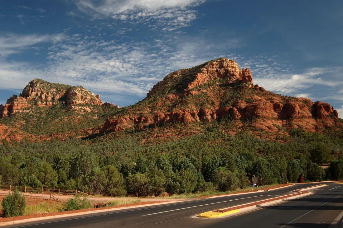 Road curving past the red rock buttes of Sedona, Arizona